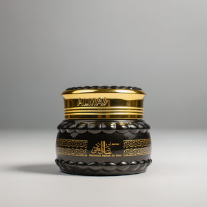Mamoul Ashiq Al Oud premium incense blocks in an elegant glass jar featuring Cambodian oud and sandalwood