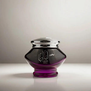 Bakhoor Layali luxury incense featuring saffron, sandalwood, and oriental oils in an elegant glass jar