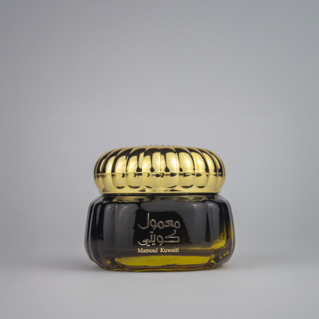 Mamoul Kuwaiti premium incense blocks in an elegant glass jar featuring Cambodian oud and sandalwood
